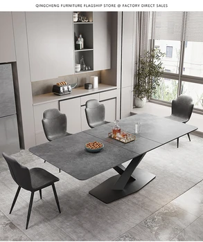 Итальянский обеденный стол в минималистичном стиле, небольшой бытовой светильник, роскошная каменная плита, телескопический деформируемый обеденный стол и стул